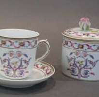 Three Tea Cups and a Covered Sugar Bowl